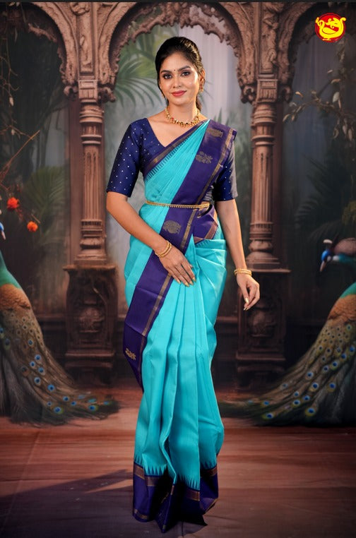 Turquoise Blue with Navy Blue Floral Border Soft Silk Saree
