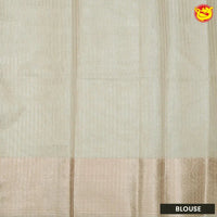 Cream linen tissue saree with embroidery details - Thenianantham