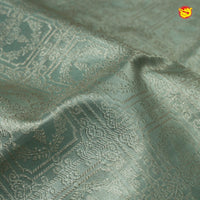 Light Pista Green With Sea Blue Checked Floral Motifs Silver Zari Border Pure Kanjivaram Subhalaya Wedding Silk Saree - Thenianantham