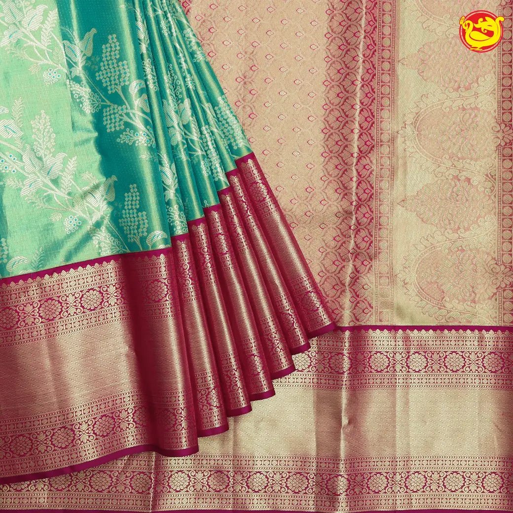 Green with magenta tissue Kanchipuram silk saree