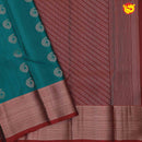 Peacock green with maroon soft silk saree with buttas