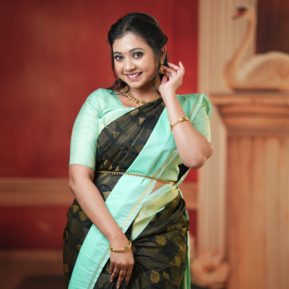 Black With Teal Green Copper Zari Border Soft Silk Saree
