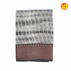 Grey chanderi silk saree with partly hand blocked design