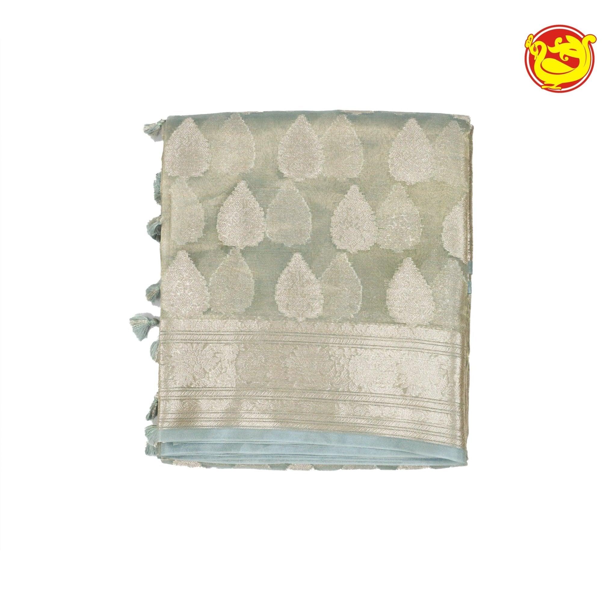 White Semi - Tissue Saree With Unique Buttas, Traditional Zari Border & Pallu Of Intricate Designs - Thenianantham