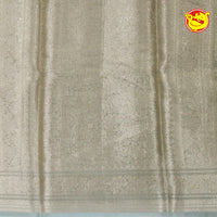 White Semi - Tissue Saree With Unique Buttas, Traditional Zari Border & Pallu Of Intricate Designs - Thenianantham