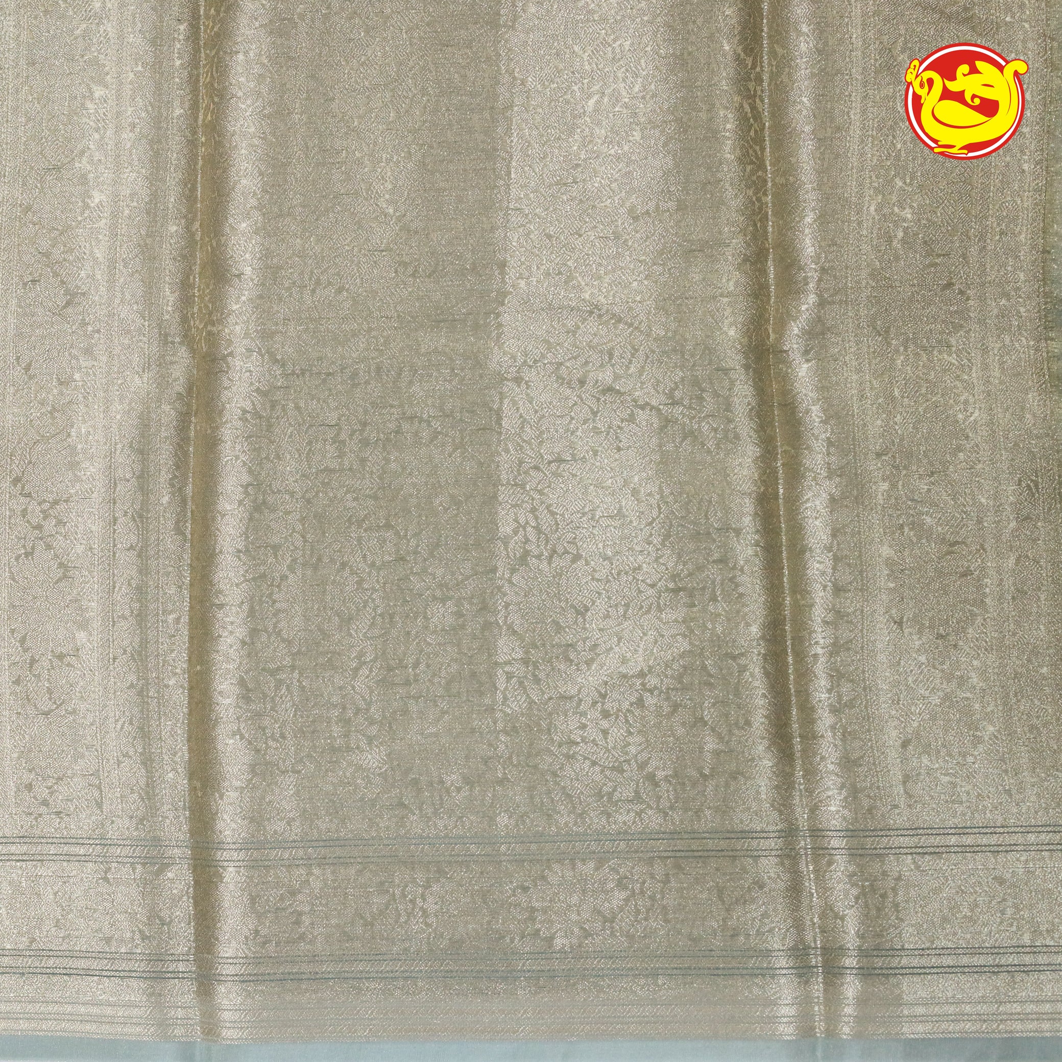 White Semi-Tissue Saree With Unique Buttas, Traditional Zari Border & Pallu Of Intricate Designs