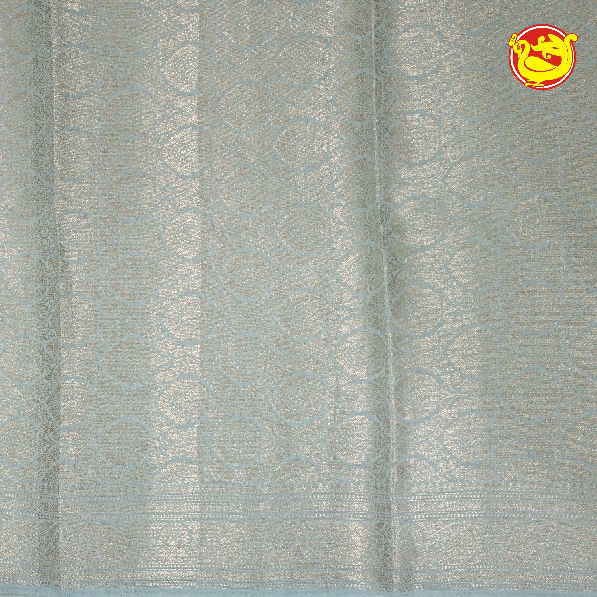 White Semi-Tissue Saree With Unique Buttas, Traditional Zari Border & Pallu Of Intricate Designs