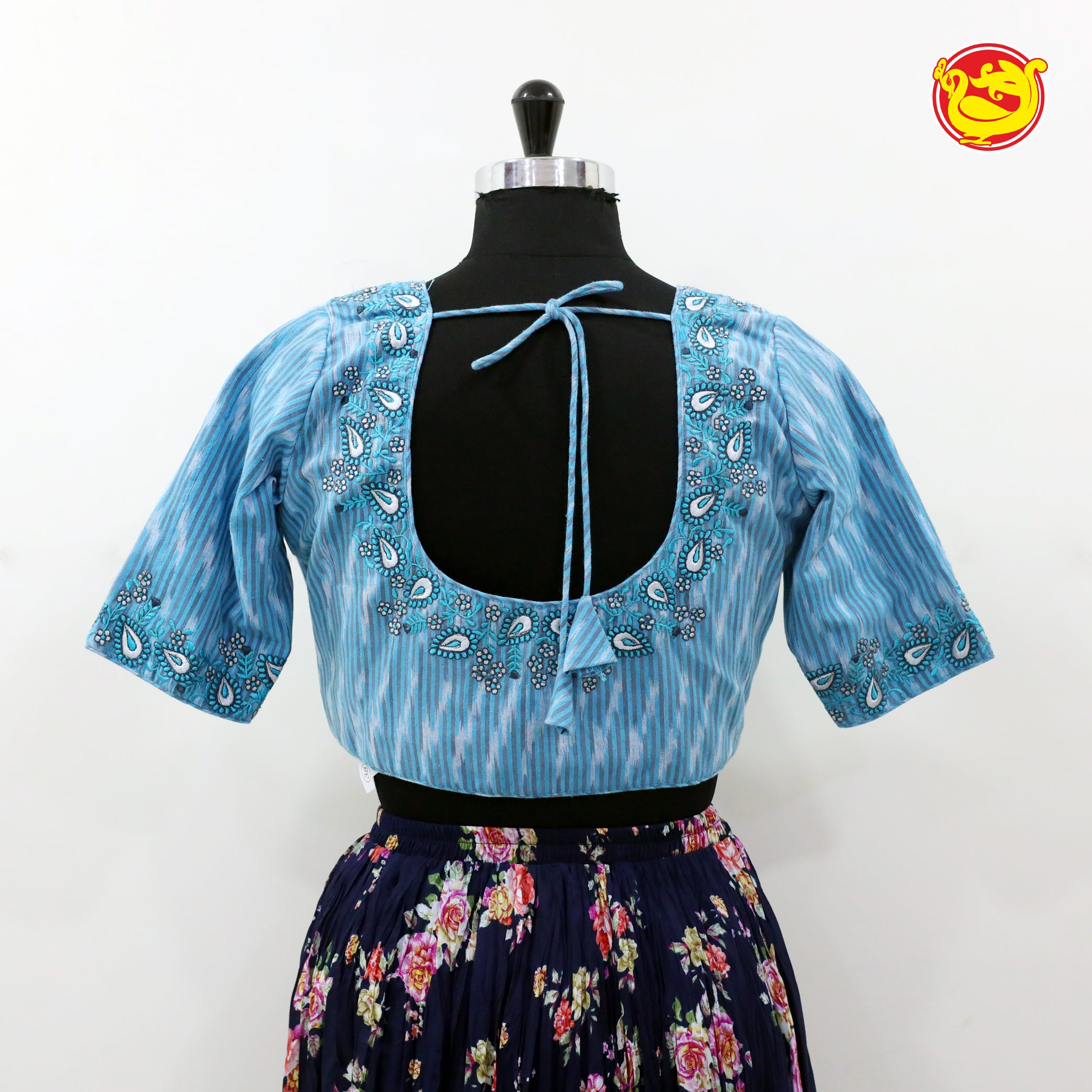 Light blue ikat cotton blouse with embroidery
