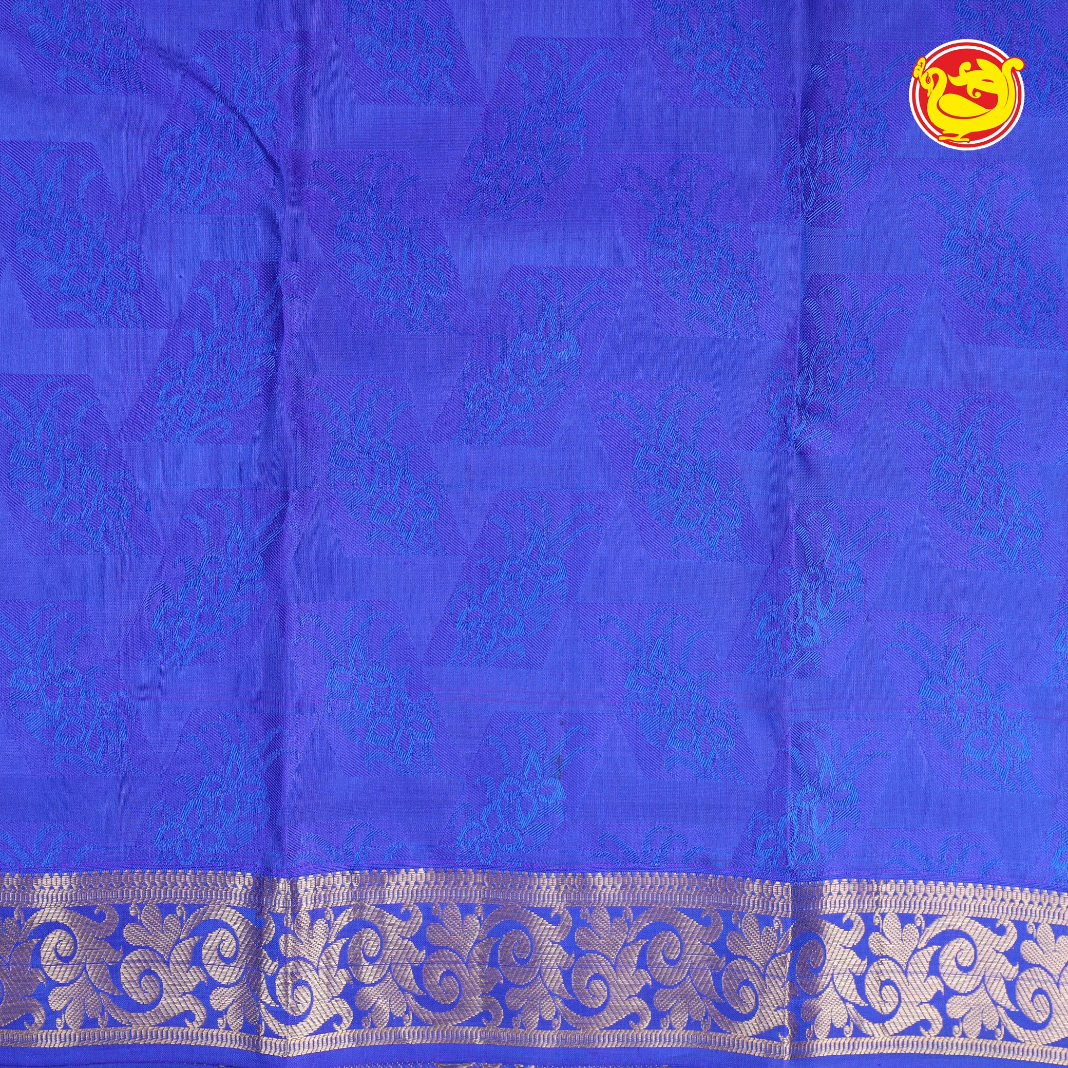 Rani pink with blue embossed silk saree