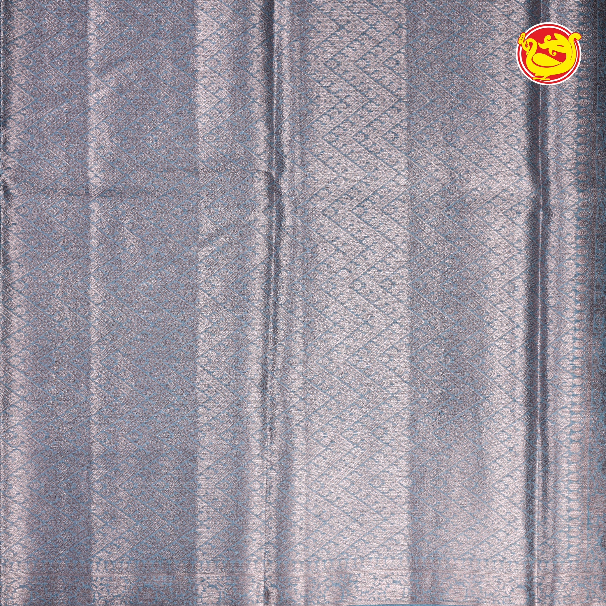 Bluish grey tussar silk saree with silk re zari buttas